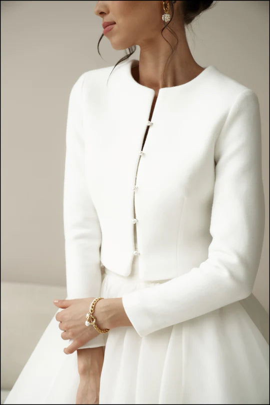 Bridal jacket in classic style with pearl buttons. Wedding coat for bride.
