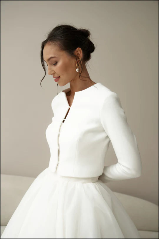 Bridal jacket in classic style with pearl buttons. Wedding coat for bride.